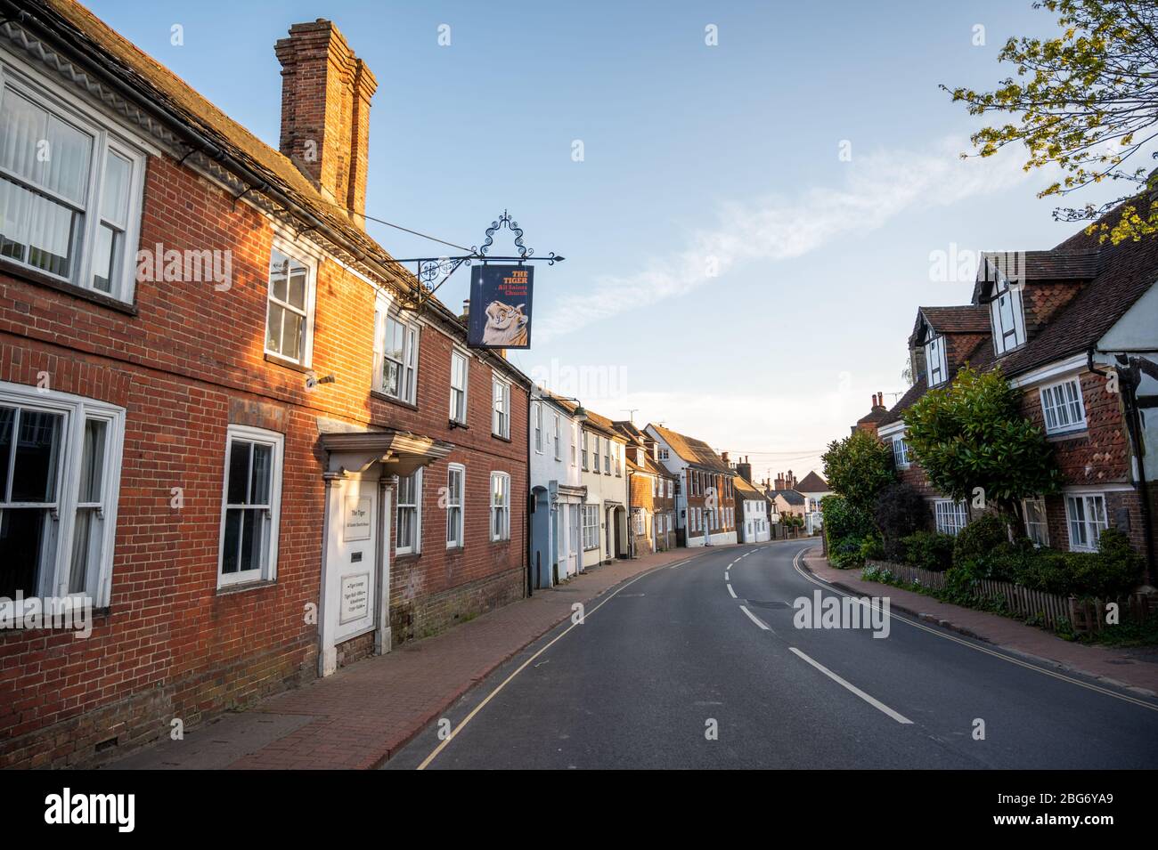 View down northern part of High Street with The Tiger All Saints Church