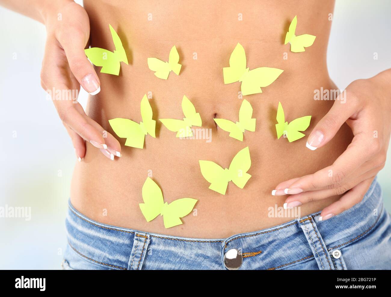 Woman hand on stomach not pregnant hi-res stock photography and images -  Page 14 - Alamy