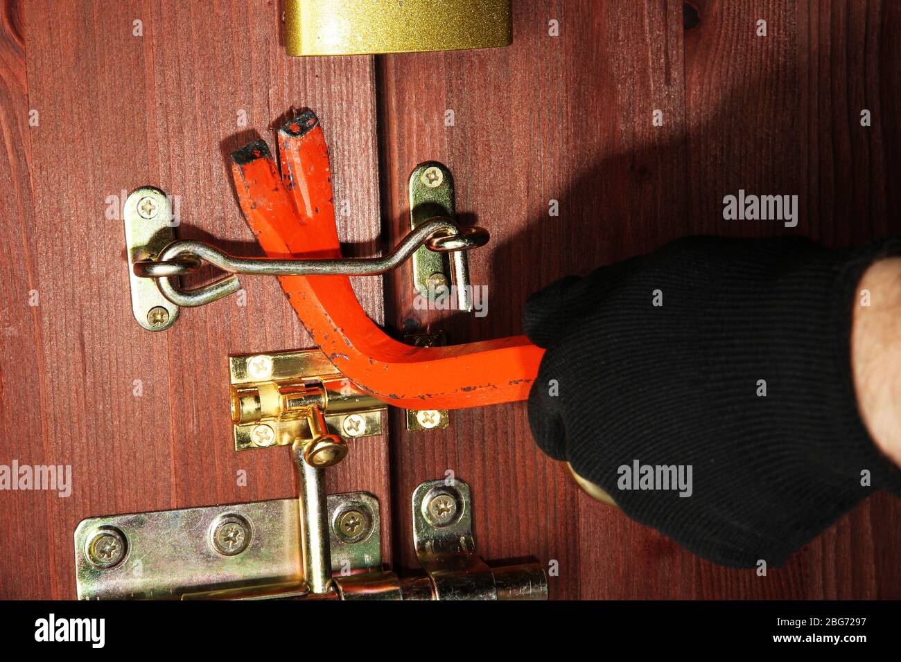 Robber breaks castle in door closeup Stock Photo Alamy