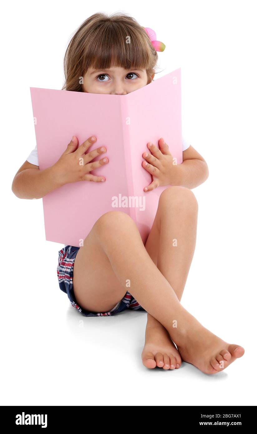 Little girl sitting on floor with book isolated on white Stock Photo ...