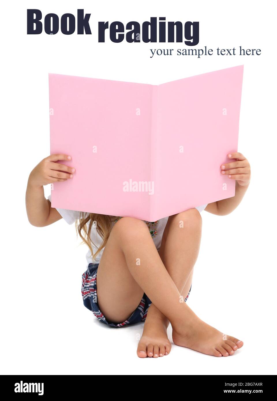 Little girl sitting on floor with book isolated on white Stock Photo ...