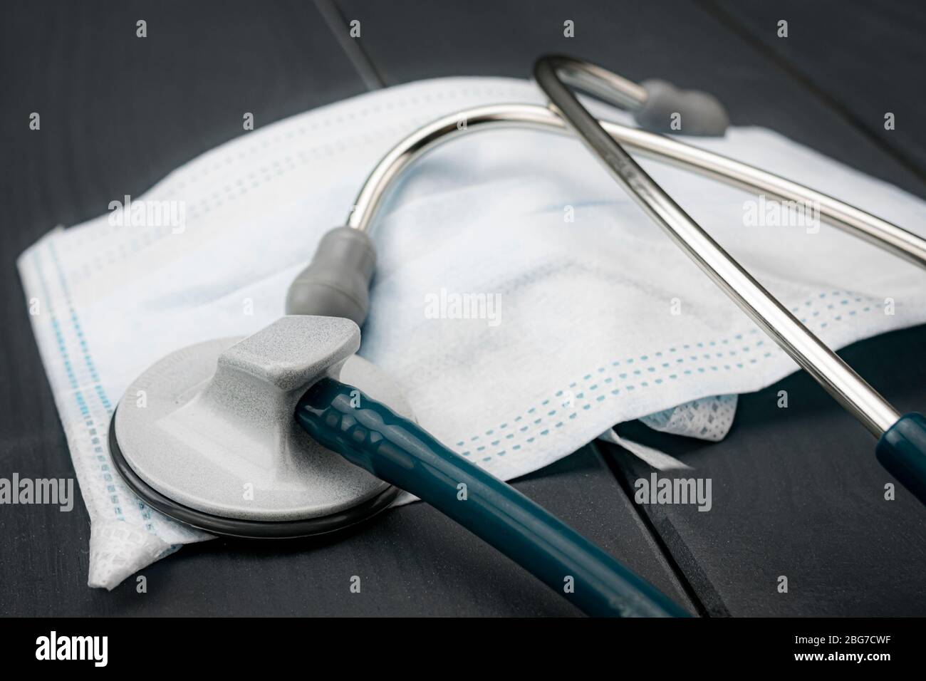 Stethoscope and face mask to prevent and diagnose respiratory viral or bacterial diseases such as coronavirus or covid-19 Stock Photo