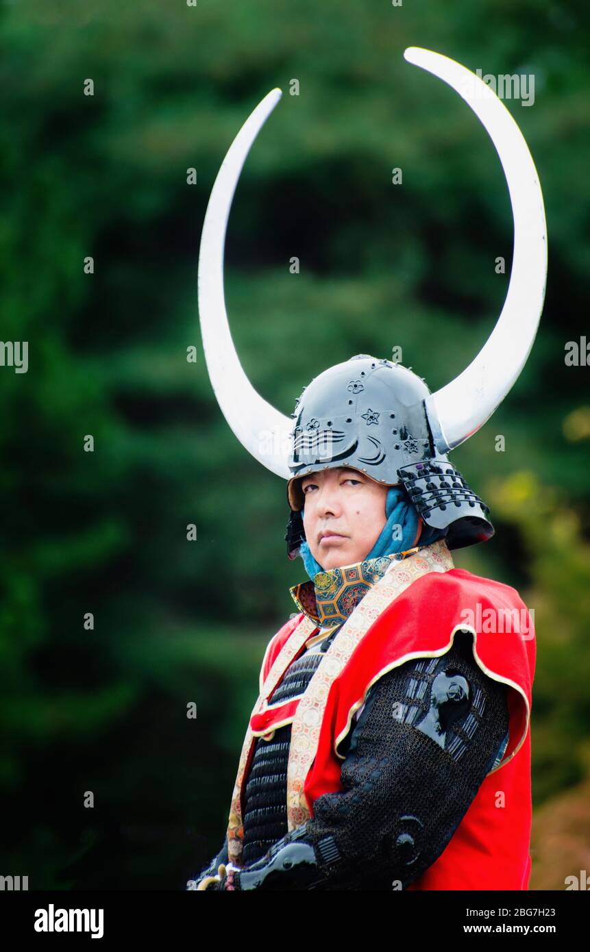 Samurai warrior wearing A Hoshi-Bachi Kabuto helmet (Momoyama period) with water buffalo horns during the Jidai Matsuri festival in Kyoto, Japan Stock Photo