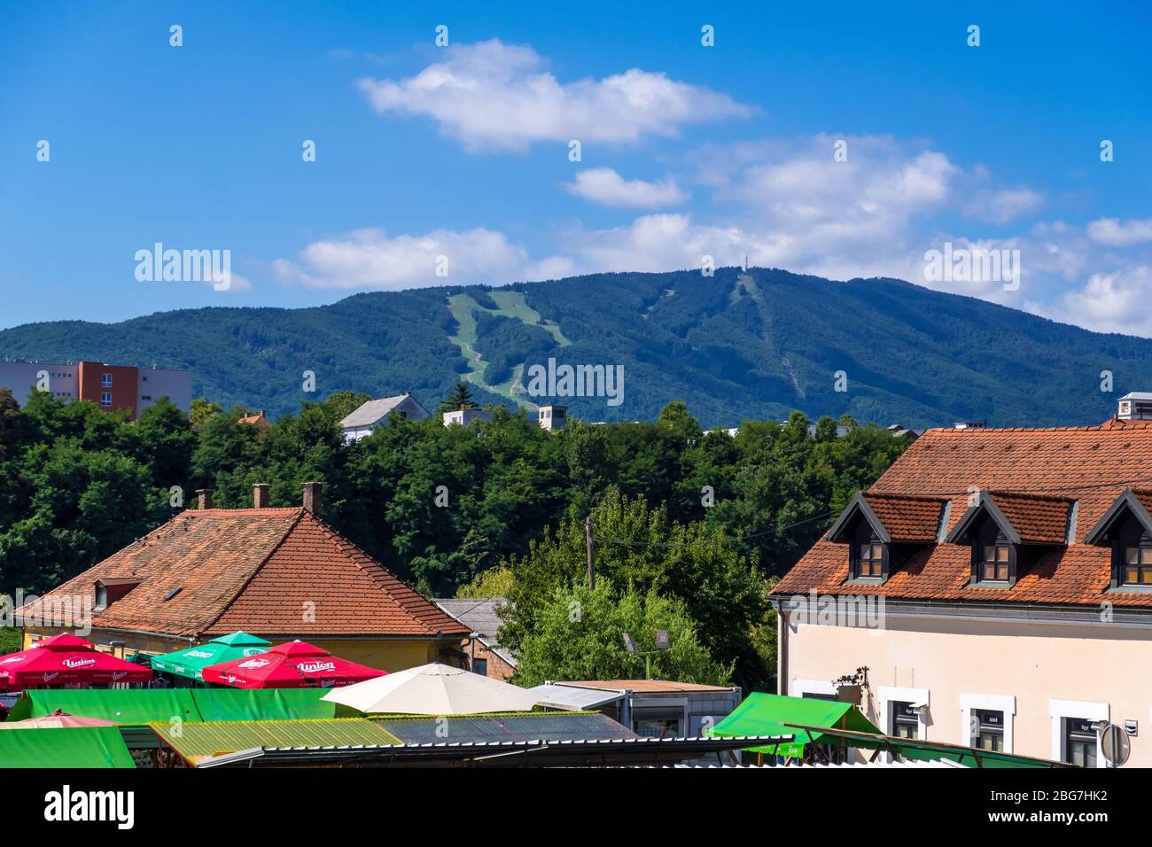 Maribor, Slovenia - August 09, 2019: View of the roofs Old Town and mountain in Maribor, Slovenia, Eastern Alps Stock Photo
