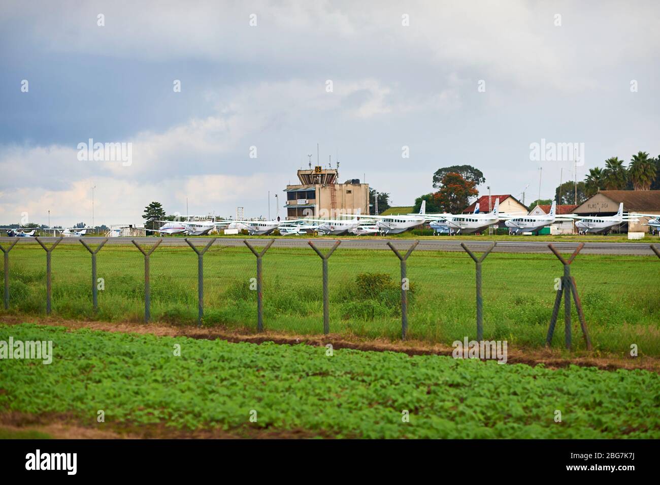 A fleet of Cessna Caravan aircraft parked on Arusha's airport for next day's flight Stock Photo