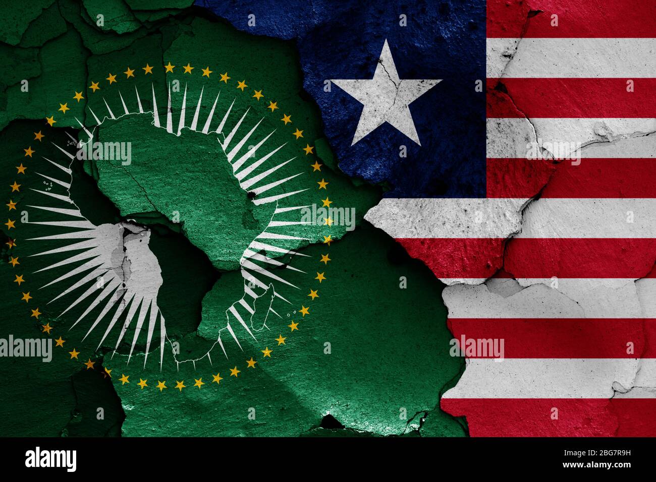 flags of African Union and Liberia painted on cracked wall Stock Photo