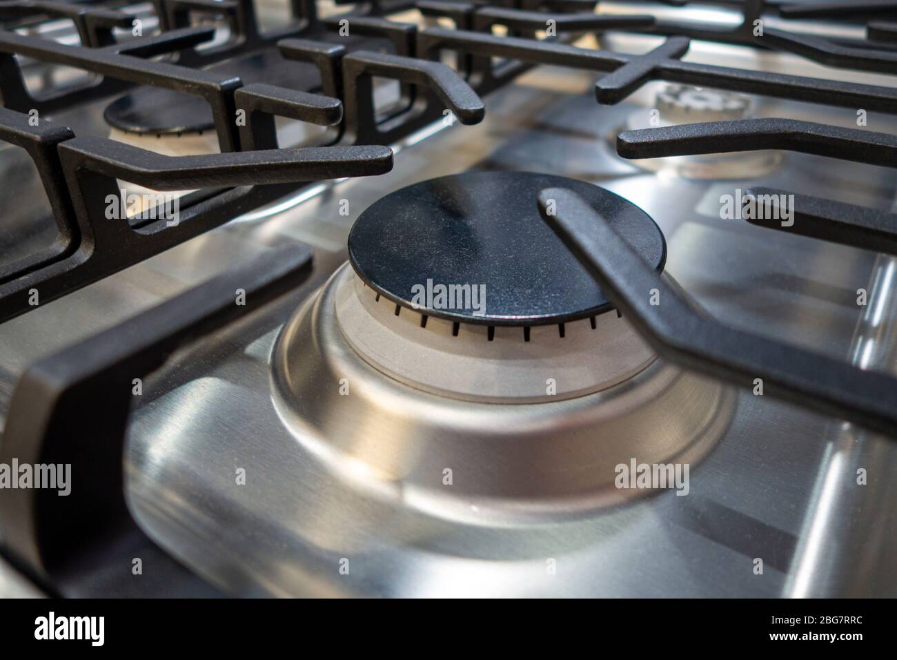 residential kitchen burner and range dials close up Stock Photo
