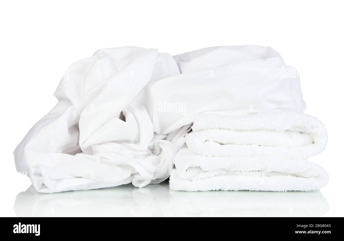 Bedding sheets and towels isolated on white Stock Photo Alamy