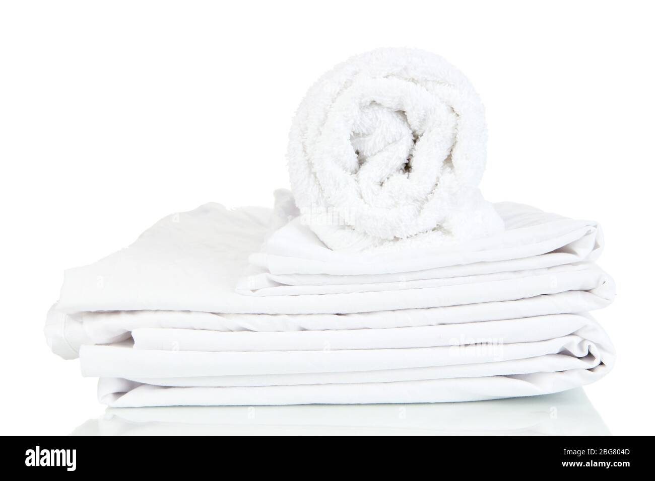Bedding sheets and towels isolated on white Stock Photo Alamy