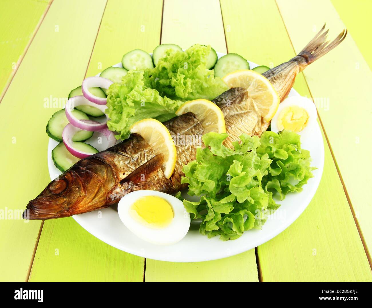 Smoked fish on plate close up Stock Photo Alamy