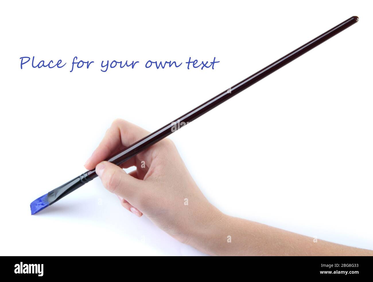 Hand holding brush with blue paint isolated on white Stock Photo - Alamy