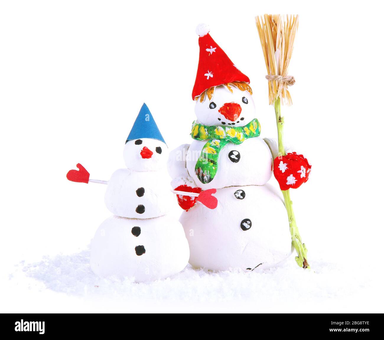 Beautiful snowmen isolated on white Stock Photo - Alamy