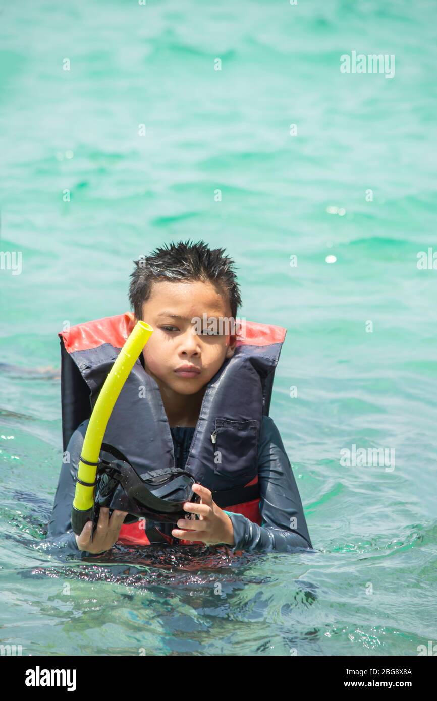 Child Wearing Life Jacket High Resolution Stock Photography and Images ...