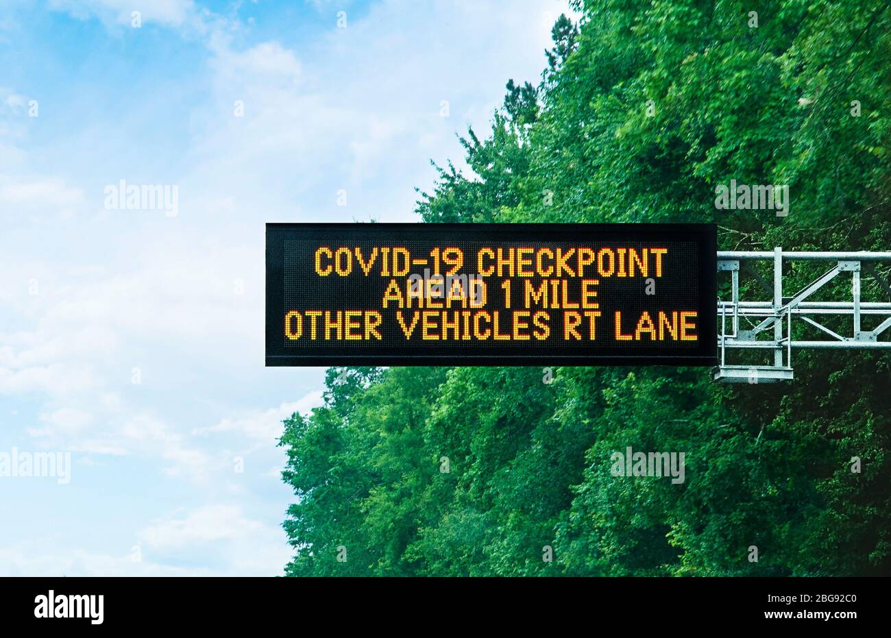 Covid-19 Checkpoint sign on I95 highway in Florida on state line border Stock Photo
