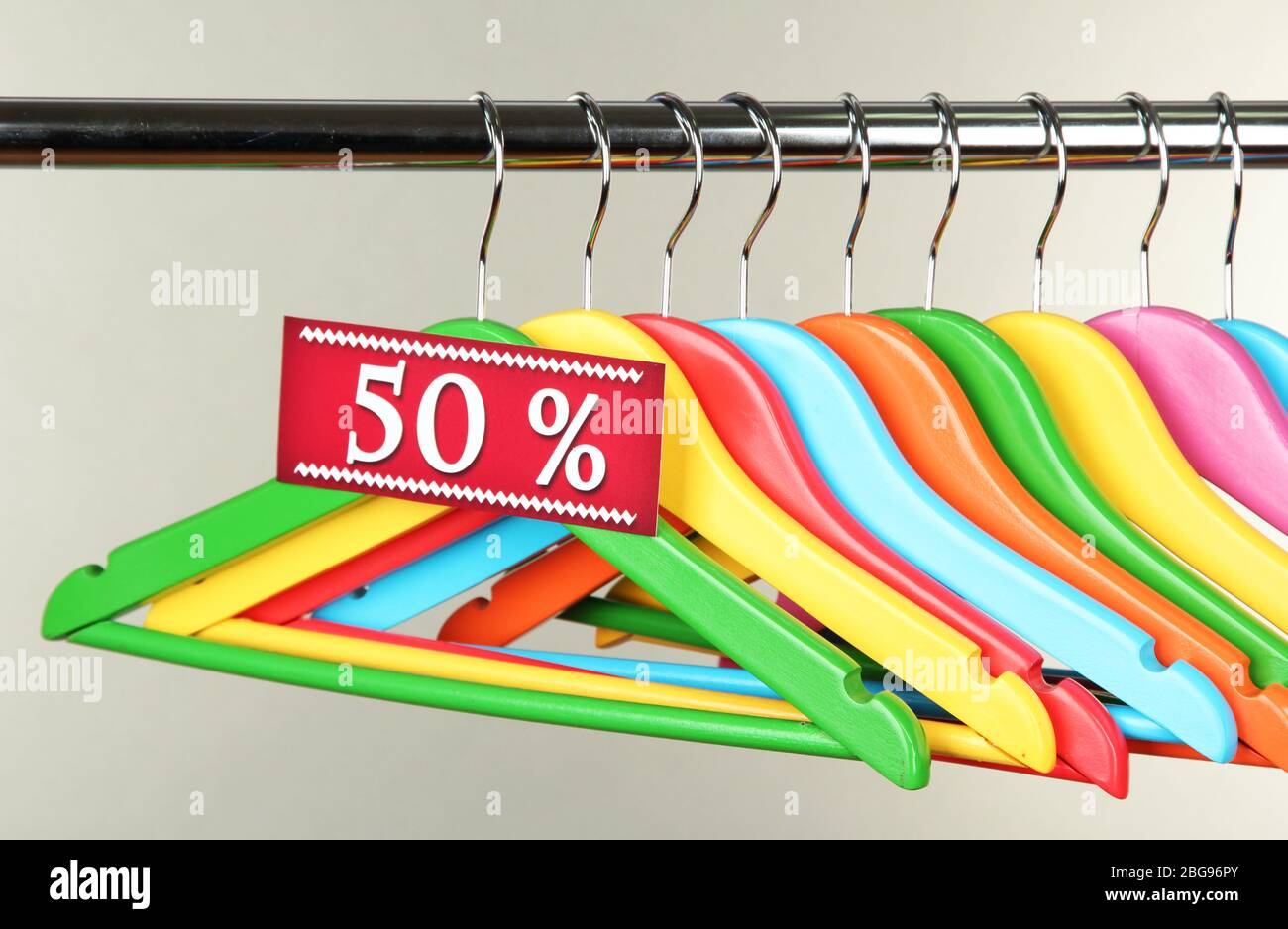 gray wooden hangers