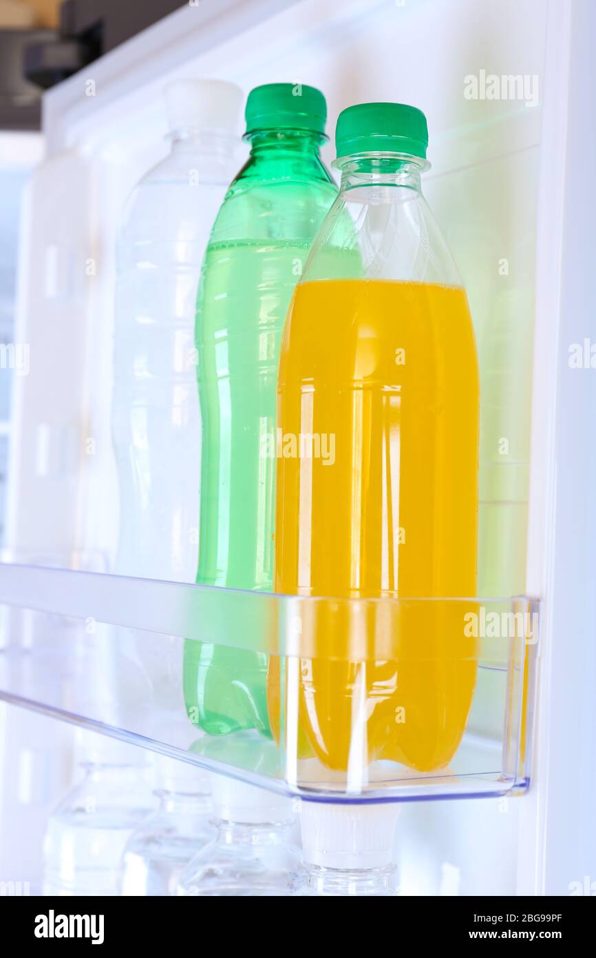 https://c8.alamy.com/comp/2BG99PF/bottles-with-drinks-in-refrigerator-2BG99PF.jpg