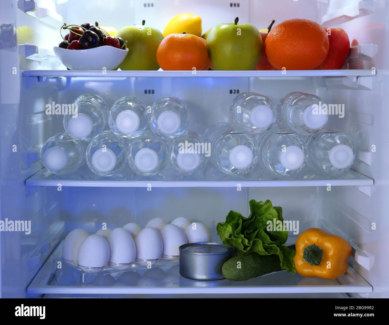Refrigerator full of food Stock Photo