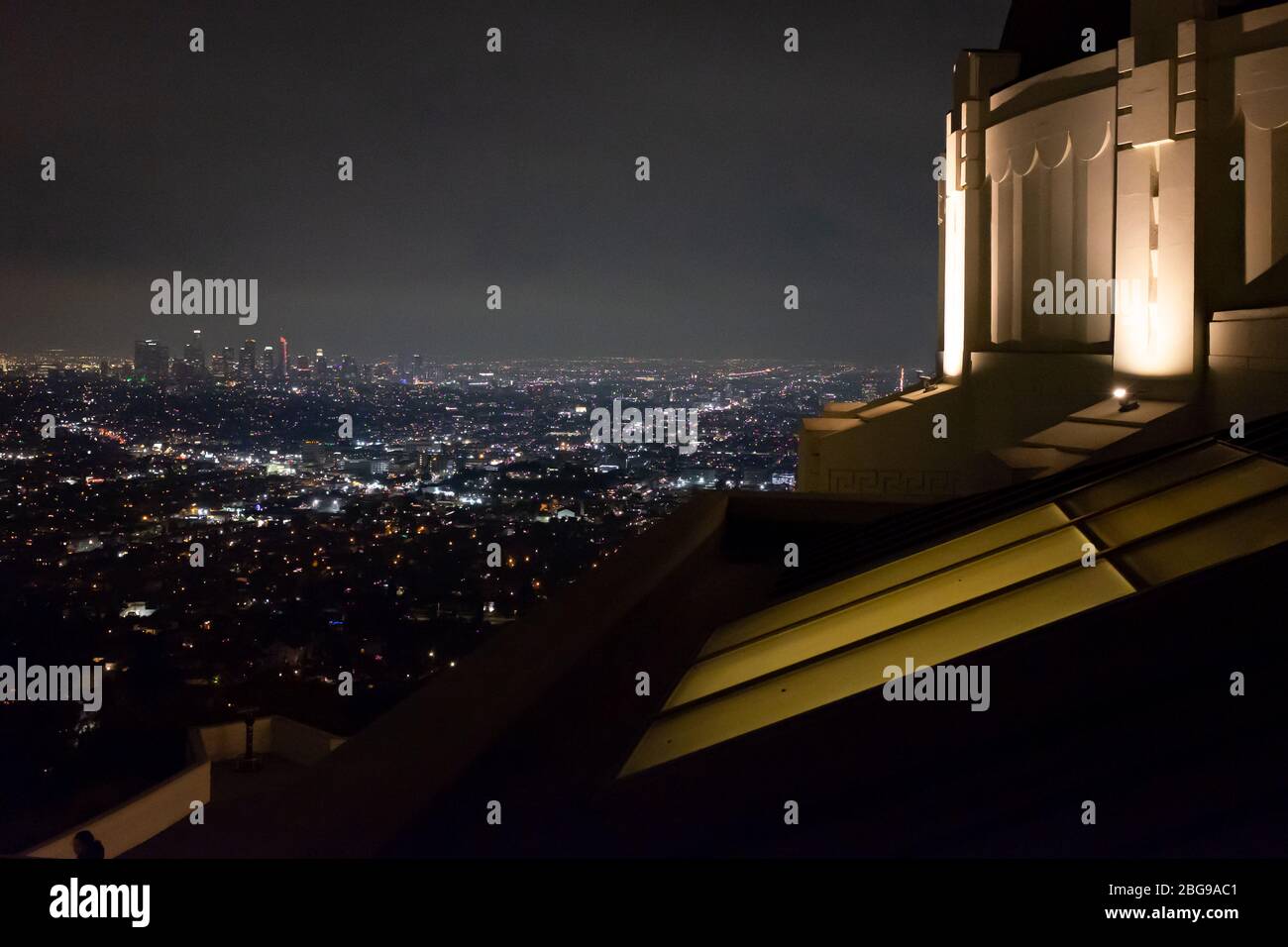 The Los Angeles Skyline is seen at night from Griffith Observatory, Los Angeles, California, USA Stock Photo