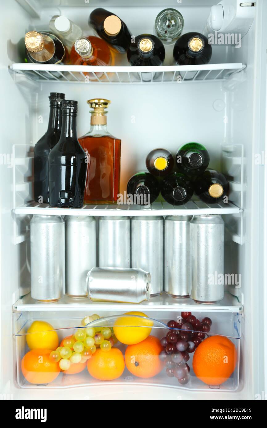 Refrigerator full of bottles with alcoholic drinks Stock Photo Alamy