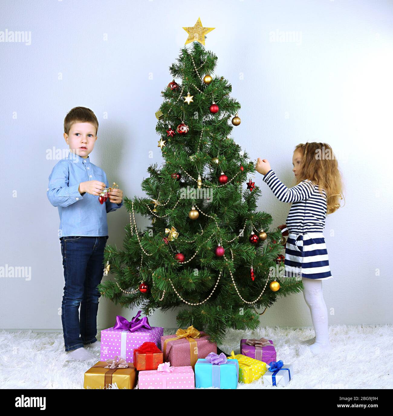 Decorating Christmas Tree Child Royalty-Free Images, Stock Photos &  Pictures
