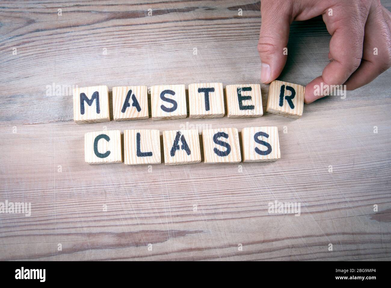 Master Class. Webinar, training, retraining and hobbies concept. Alphabet letters on wooden table Stock Photo