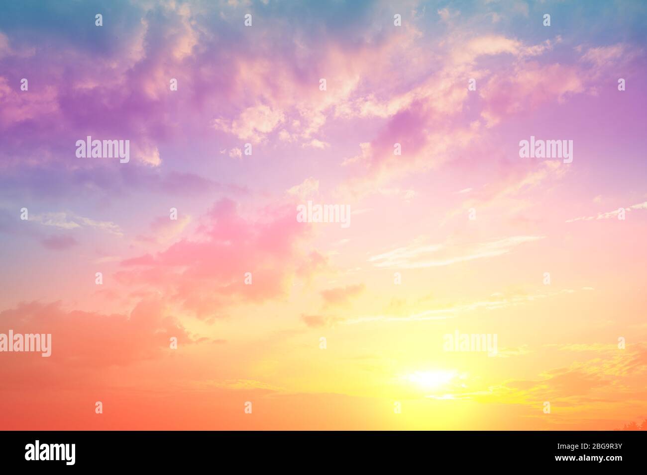 Colorful cloudy sky at sunset. Gradient color. Sky texture, abstract nature background Stock Photo
