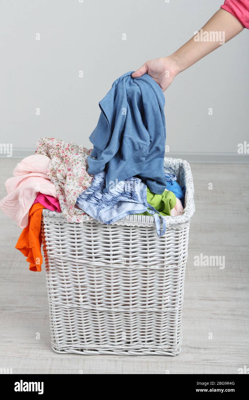 Woman put on laundry hi-res stock photography and images - Alamy
