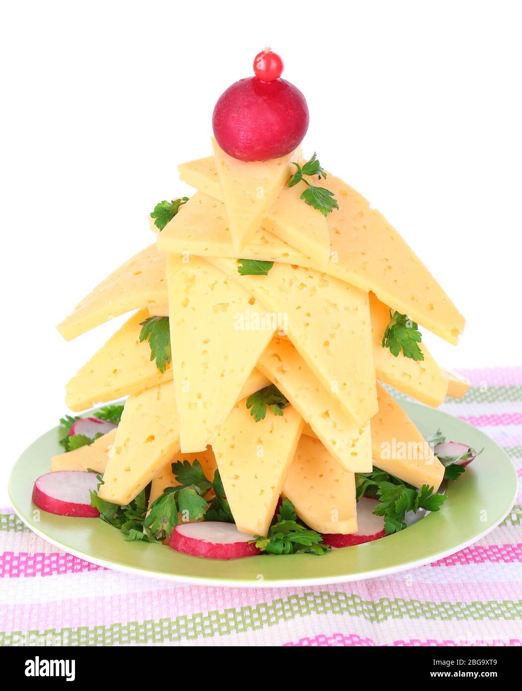 Christmas tree from cheese on table on white background Stock Photo