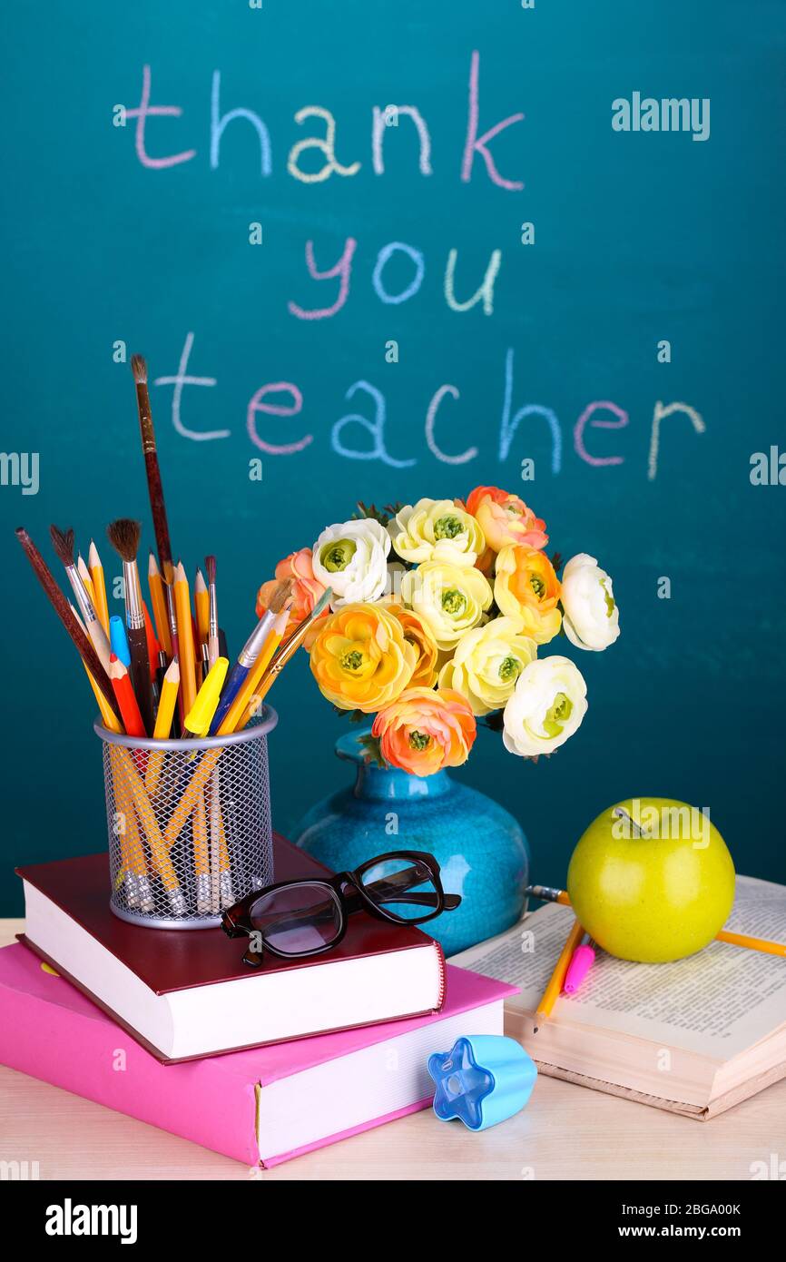 School supplies and flowers on blackboard background with inscription Thank  you teacher Stock Photo - Alamy, image size:866x1390