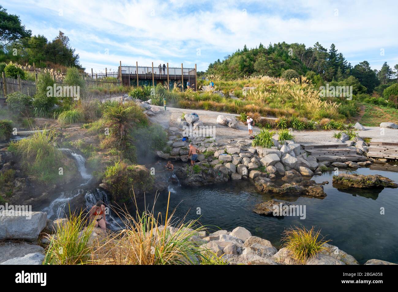 Hot water from Otumuheke Stream running into Waikato River at Spa Thermal Park, Taupo, North Island, New Zealand Stock Photo