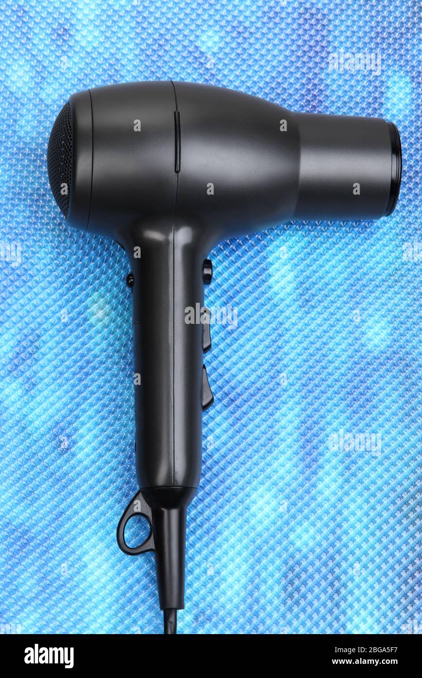 Blue hair dryer hi-res stock photography and images - Alamy