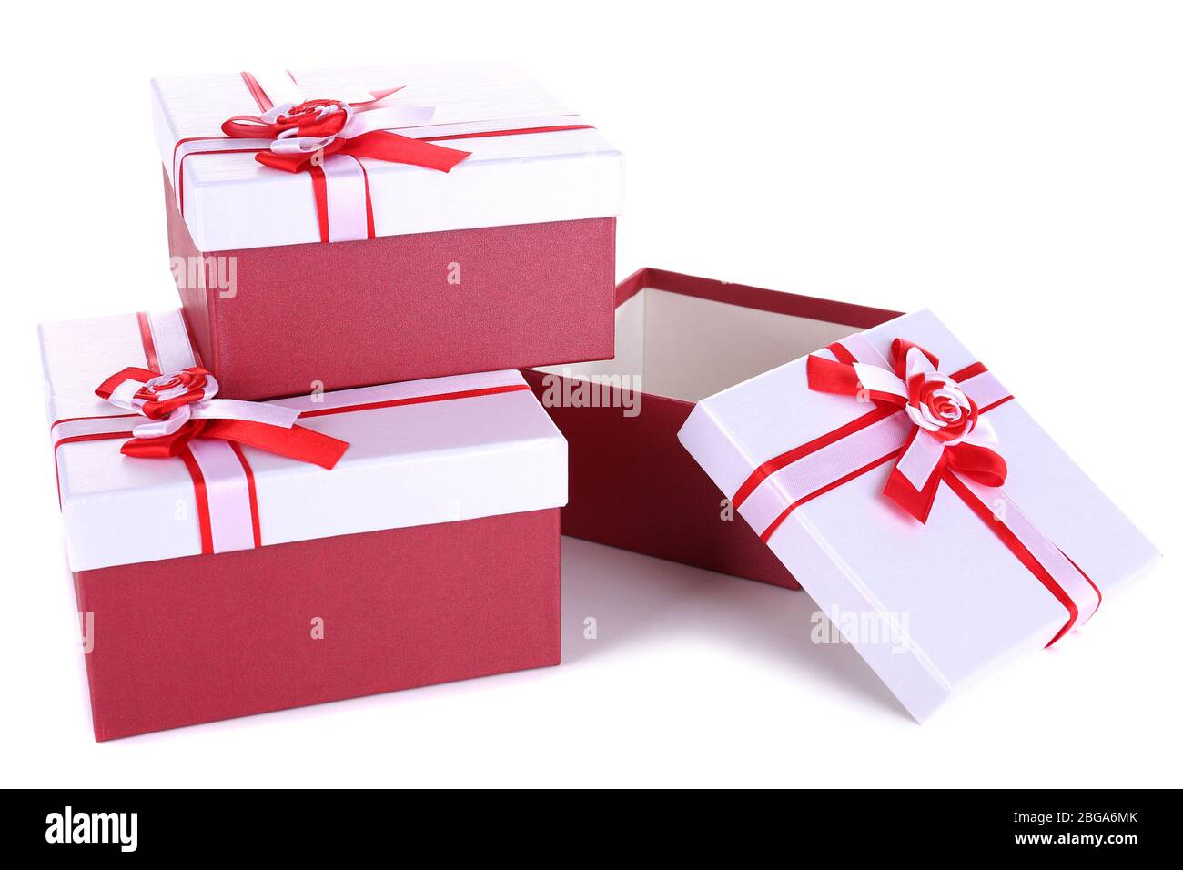 Beautiful gift boxes isolated on white Stock Photo - Alamy