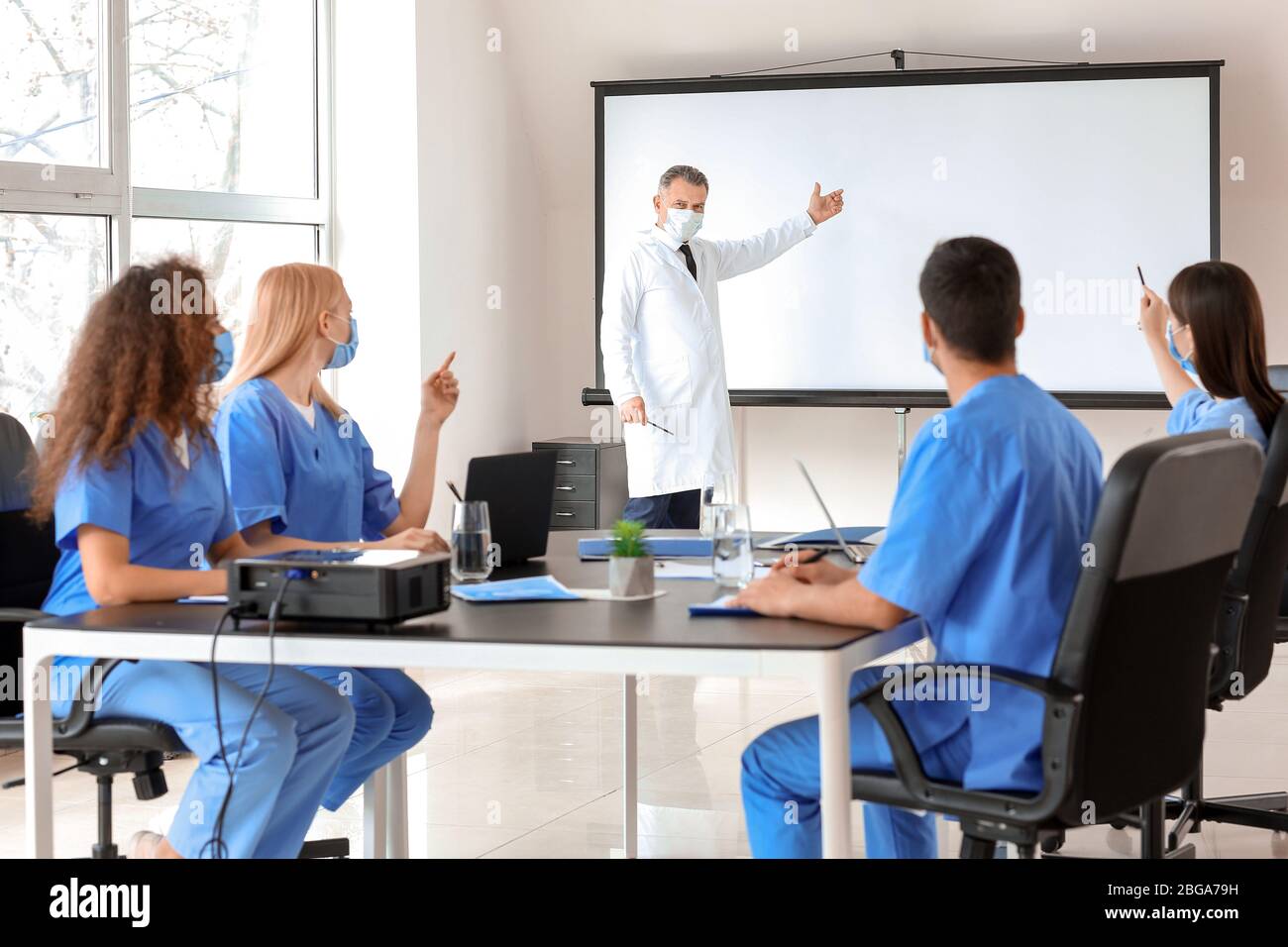 Male lecturer teaching medical students in university Stock Photo Alamy