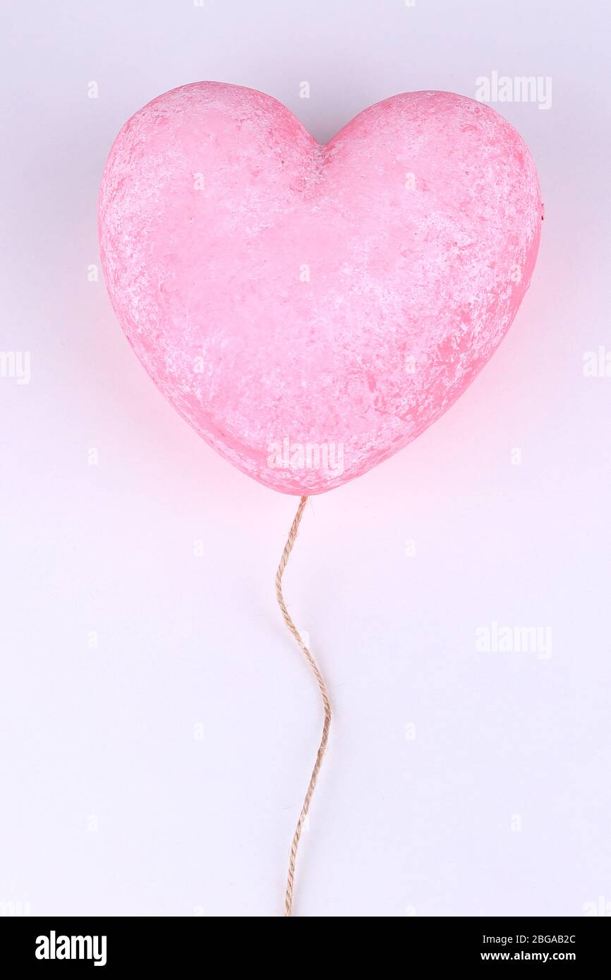 Decorative pink heart, isolated on white Stock Photo - Alamy