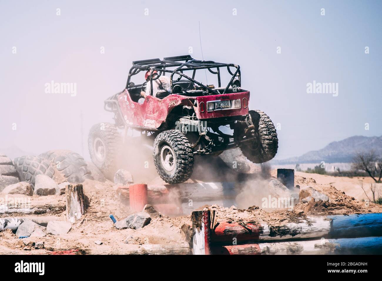 Off-road vehicles going through an obstacle cousre Stock Photo - Alamy