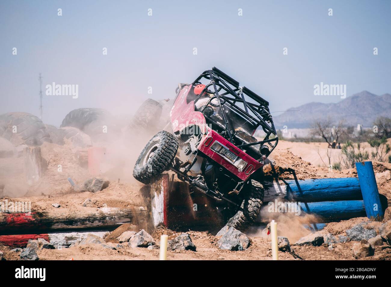 Off-road vehicles going through an obstacle cousre Stock Photo - Alamy