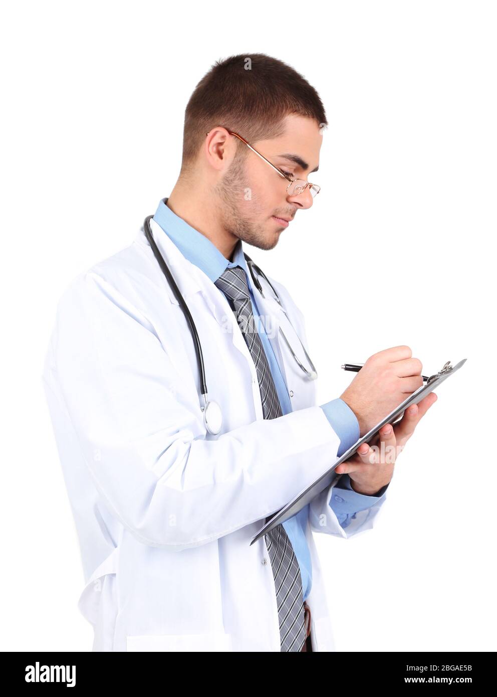 Male Doctor standing with folder, isolated on white background Stock ...
