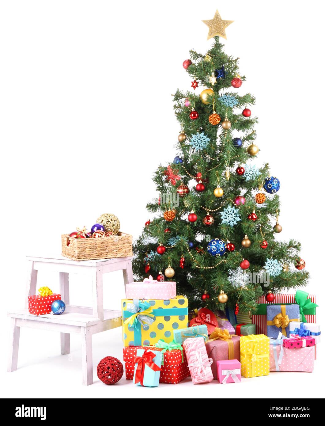 Decorated Christmas tree with gifts isolated on white Stock Photo - Alamy