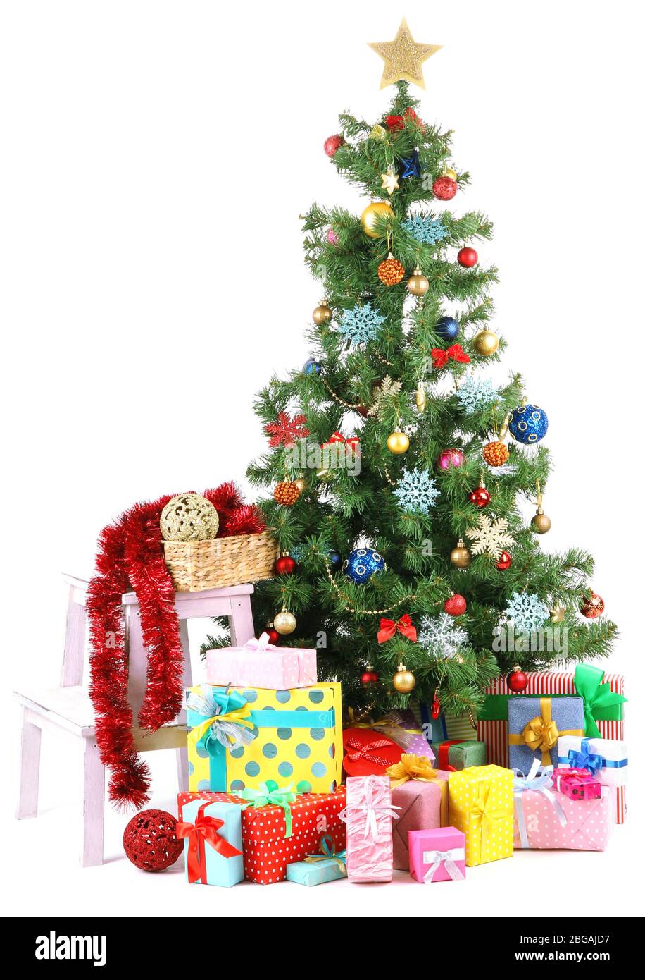 Decorated Christmas tree with gifts isolated on white Stock Photo - Alamy