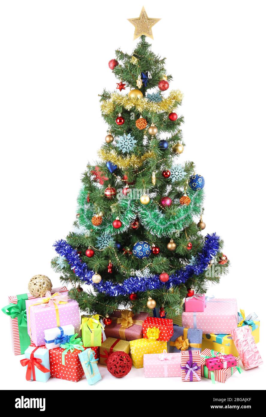 Decorated Christmas tree with gifts isolated on white Stock Photo - Alamy