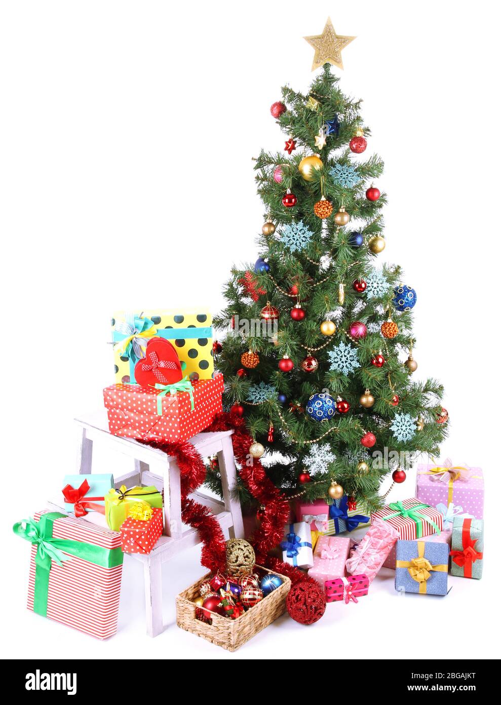 Decorated Christmas tree with gifts isolated on white Stock Photo - Alamy
