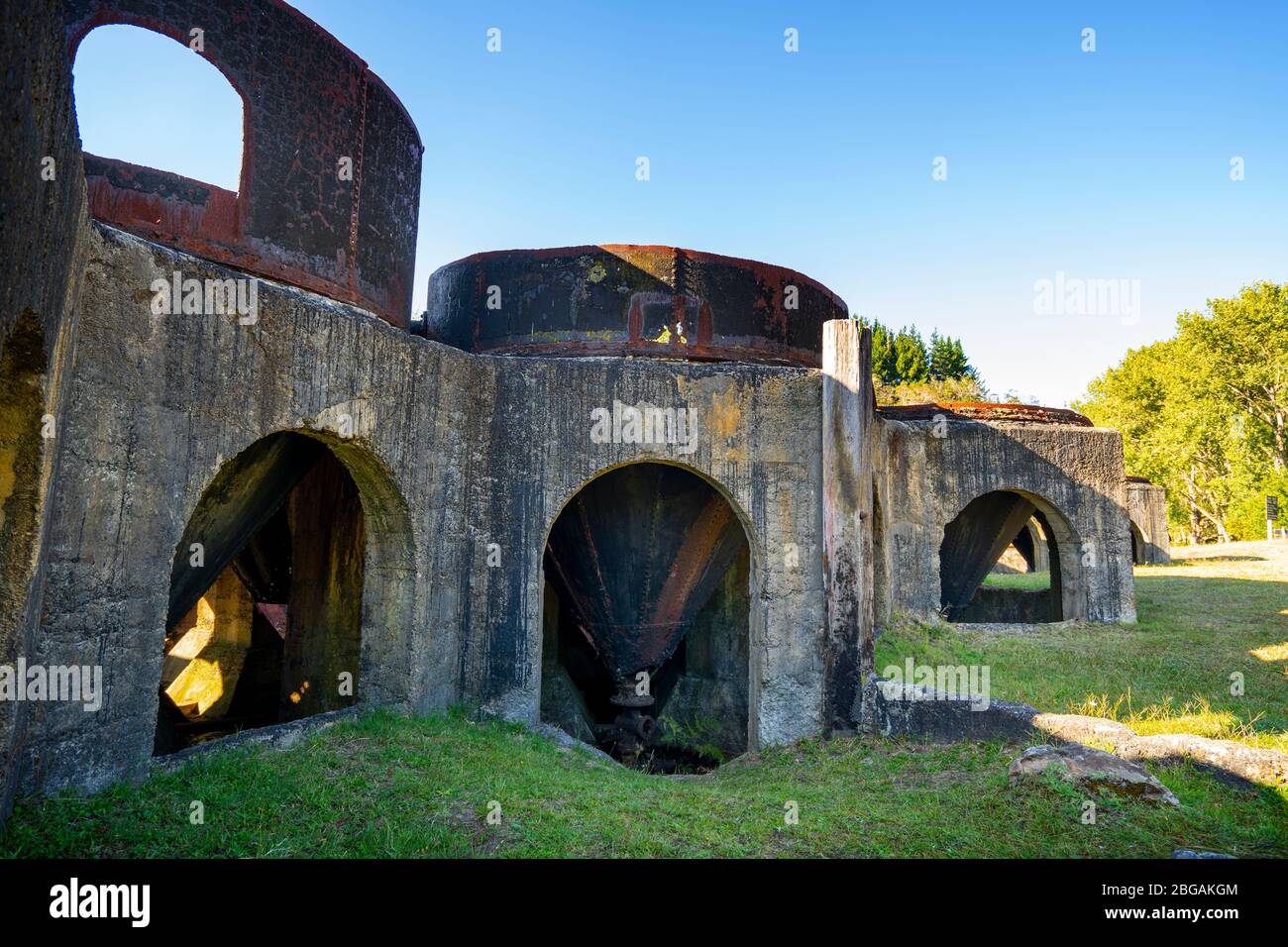Remains of the Victoria Gold Battery alongside the Ohinemuri River at Waikino, North Island New Zealand Stock Photo