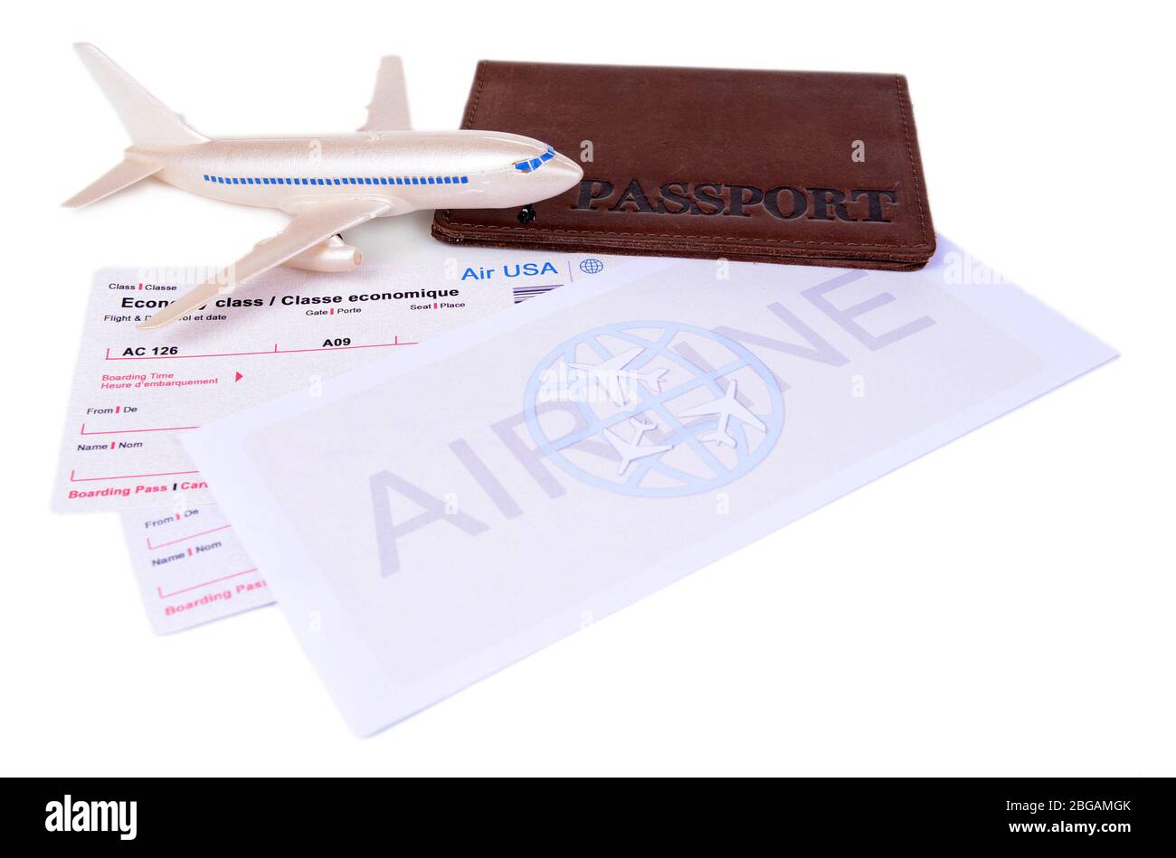 Airline tickets with passport isolated on white Stock Photo Alamy