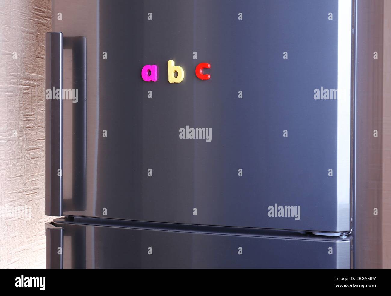 Colorful letters on refrigerator Stock Photo Alamy