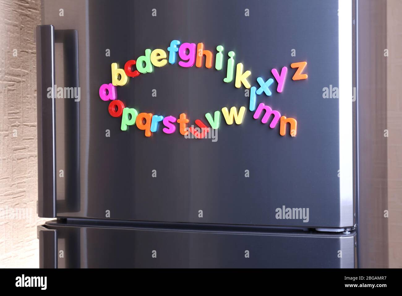 Colorful letters on refrigerator Stock Photo Alamy