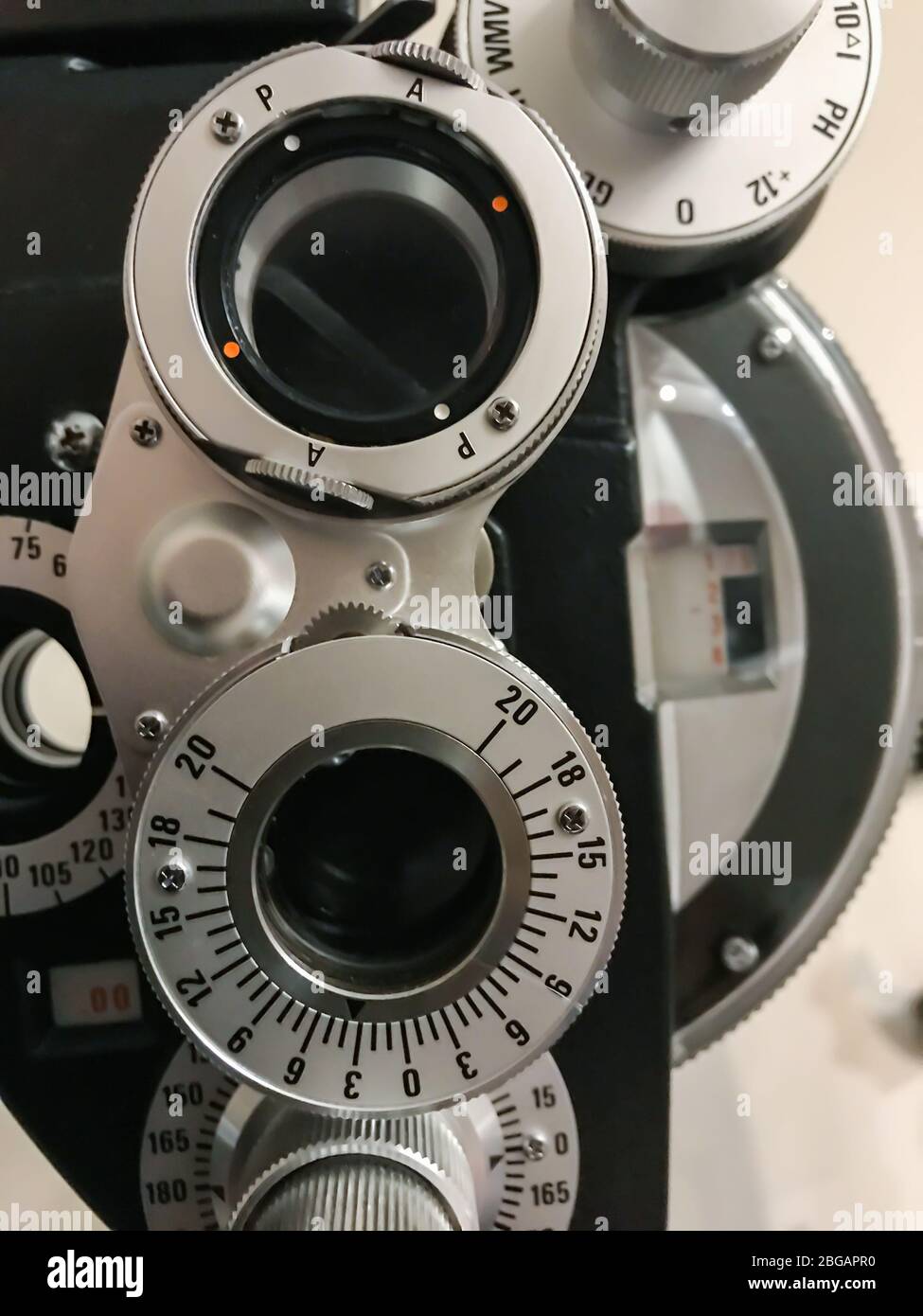 A closeup of lenses on a phoropter. Stock Photo