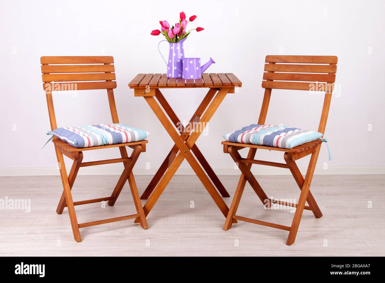 Garden chairs and table on white background Stock Photo - Alamy