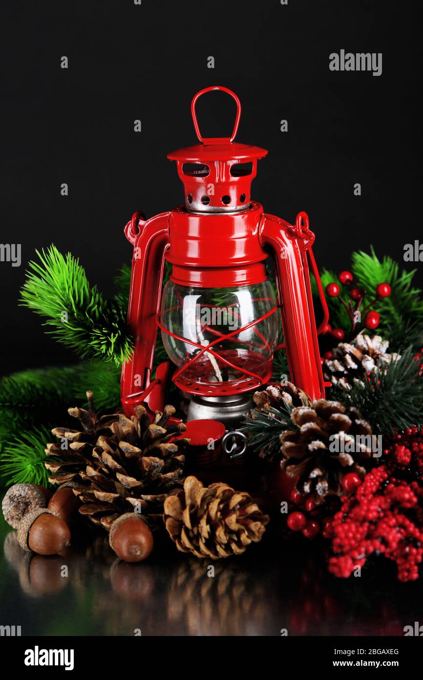 Red kerosene lamp on black background Stock Photo - Alamy