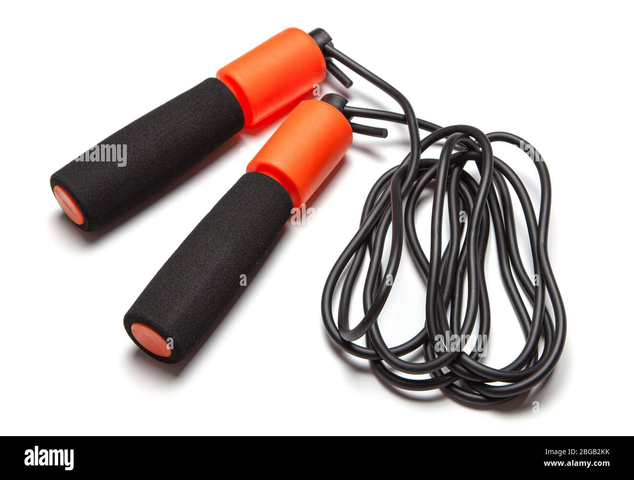 Jump rope. Fun exercises for body health. Orange rope with black cord ...