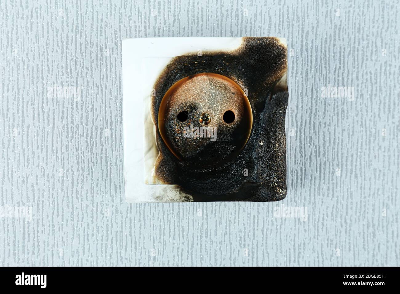 Burned plug socket close up Stock Photo Alamy